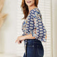 DOUBLE TAKE Tie Hem V-Neck Three-Quarter Sleeve Blouse at Bella Road