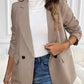 Woman wearing Perfee Plaid Lapel Collar Long Sleeve Blazer with jeans and white turtleneck, showcasing chic and sophisticated style.