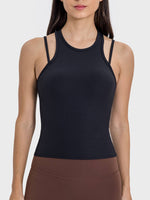 Millennia Cutout Round Neck Racerback Active Tank in black, showcasing a sleek design and comfortable fit for workouts.