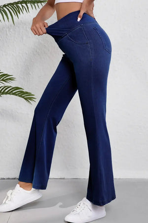 Woman wearing Asymmetric Waist Flare Jeans, showcasing the playful twist design, perfect blend of comfort and style, moderate stretch fabric