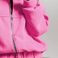 Woman wearing pink Bella Road Zip Up Long Sleeve Top and Pants Set with drawstring, showcasing trendy and comfortable fashion