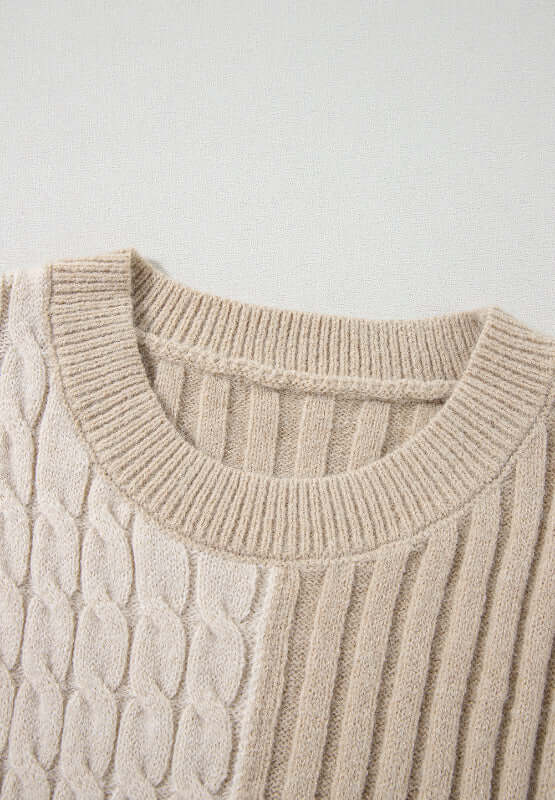 Bella Road cable-knit color block round neck sweater in tan, featuring a stylish design and cozy fabric ideal for cool weather.