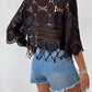 Bella Road Swim openwork black cover-up with detailed crochet design worn over denim shorts, perfect for beach days.