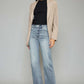 High Waist Raw Hem Cropped Wide Leg Jeans paired with a black top and beige blazer for a trendy, sophisticated look