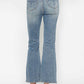 Back view of Judy Blue tummy control bootcut jeans with embroidered pockets, perfect for a stylish plus size look.