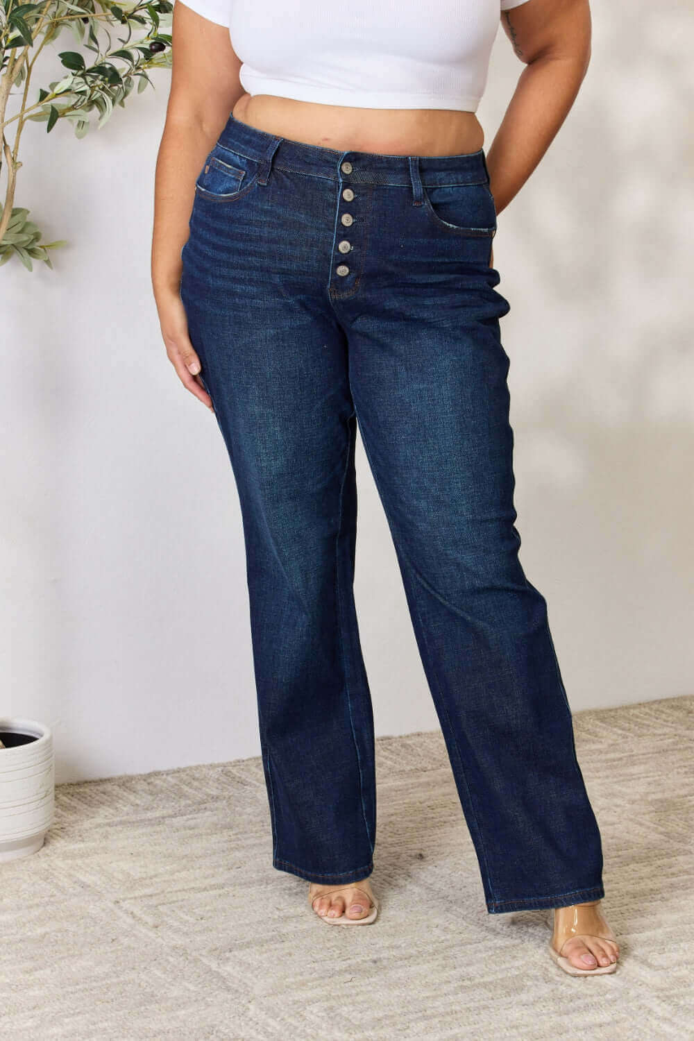 Woman wearing Judy Blue Button-Fly Straight Jeans with high waist and slightly stretchy fabric for all-day comfort and style.