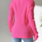 Stylish pink openwork long sleeve sweater with jeans, showcasing back view and intricate sleeve design. Cozy and fashionable look.