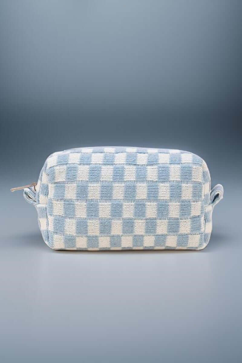 Stylish blue checkered knitted cosmetic pouch with zipper closure, perfect for organizing makeup essentials.