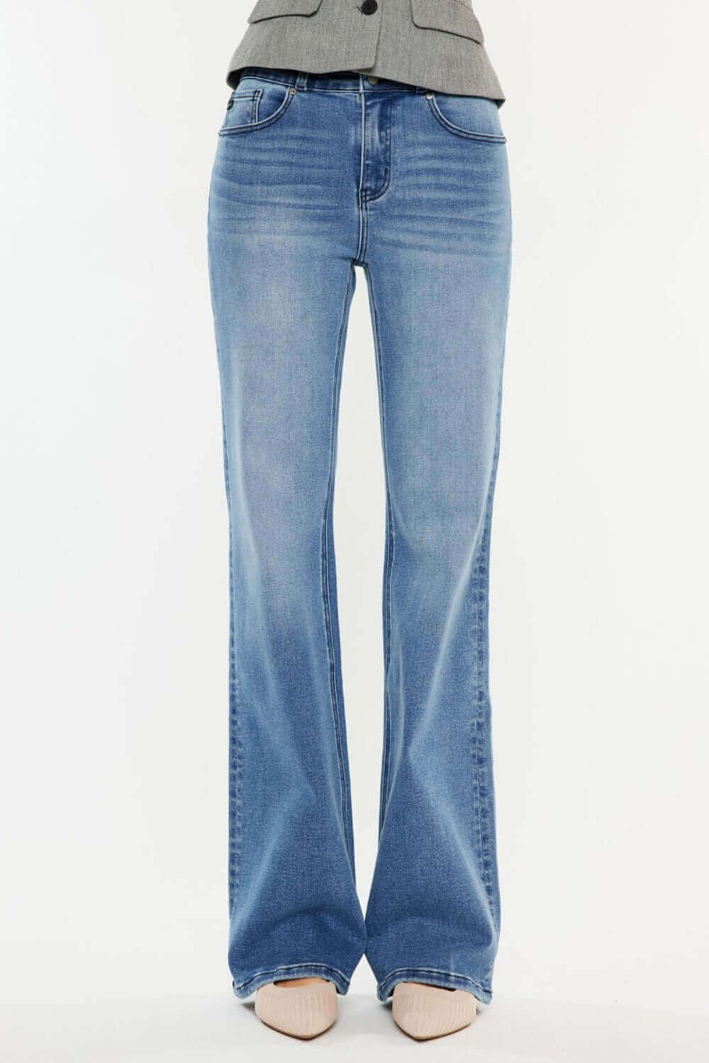 Ultra High Rise Cat's Whiskers Jeans with vintage detailing, showcasing modern high-waisted silhouette and elongated legs, perfect for any occasion.