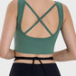 Back view of the Millennia Crisscross Square Neck Active Tank in green, showcasing its stylish crisscross design.