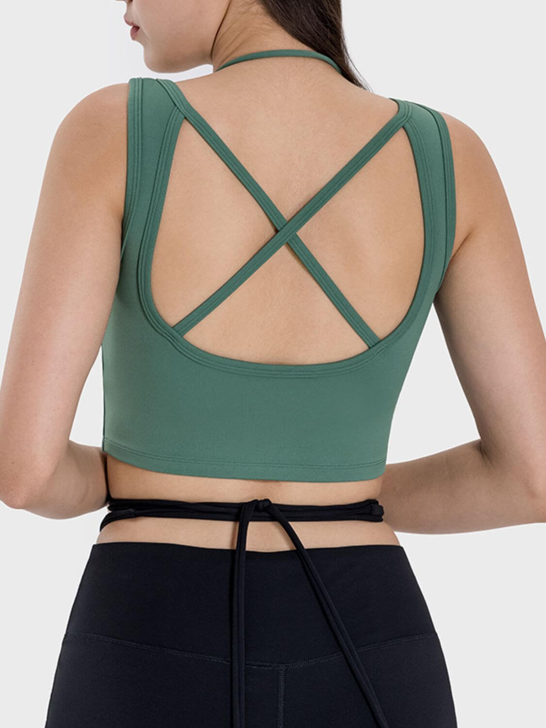 Back view of the Millennia Crisscross Square Neck Active Tank in green, showcasing its stylish crisscross design.