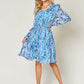 DOUBLE TAKE Full Size Printed Drawstring Waist Long Sleeve Dress at Bella Road