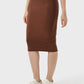 Model wearing a Millennia Slit Wrap Active Skirt in brown, paired with casual shoes and a stylish top.