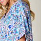 DOUBLE TAKE Full Size Printed V-Neck Short Sleeve Blouse at Bella Road