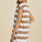 Woman wearing Basic Bae Full Size Striped Round Neck Cap Sleeve Mini Dress in brown and white.