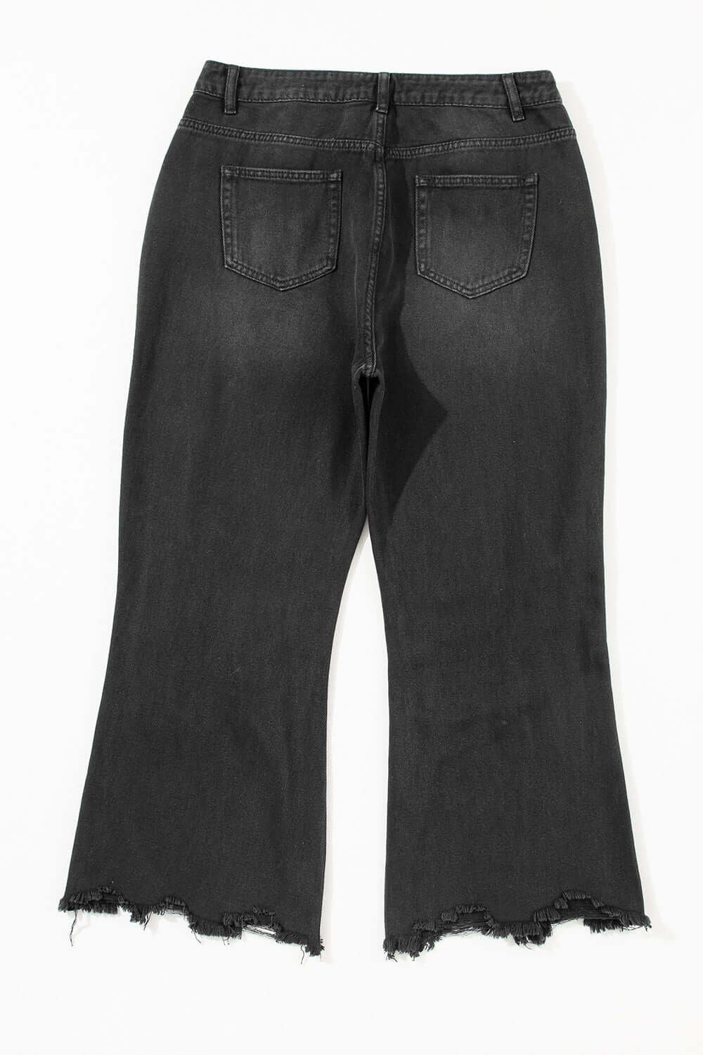 Back view of Distressed Raw Hem Jeans with Pockets in black, featuring frayed edges and a stylish, trendy design.