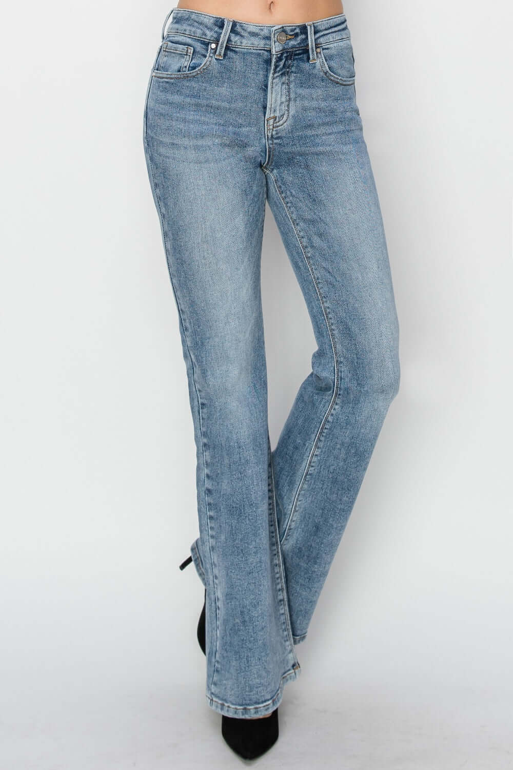 Stylish mid-rise bootcut Risen Jeans in light wash, perfect for a flattering and versatile look.