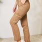 High Waist Straight Jeans with Pockets in beige, worn with white sneakers for a stylish and practical look by Risen Jeans