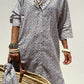 Woman wearing Bella Road Tied Button Up Three-Quarter Sleeve Dress holding a woven bag and accessorized with bracelets