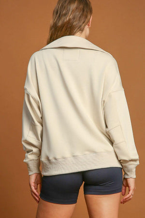 Back view of Umgee Johnny Collar Dropped Shoulder Sweatshirt in light beige, showcasing its relaxed fit and modern style.