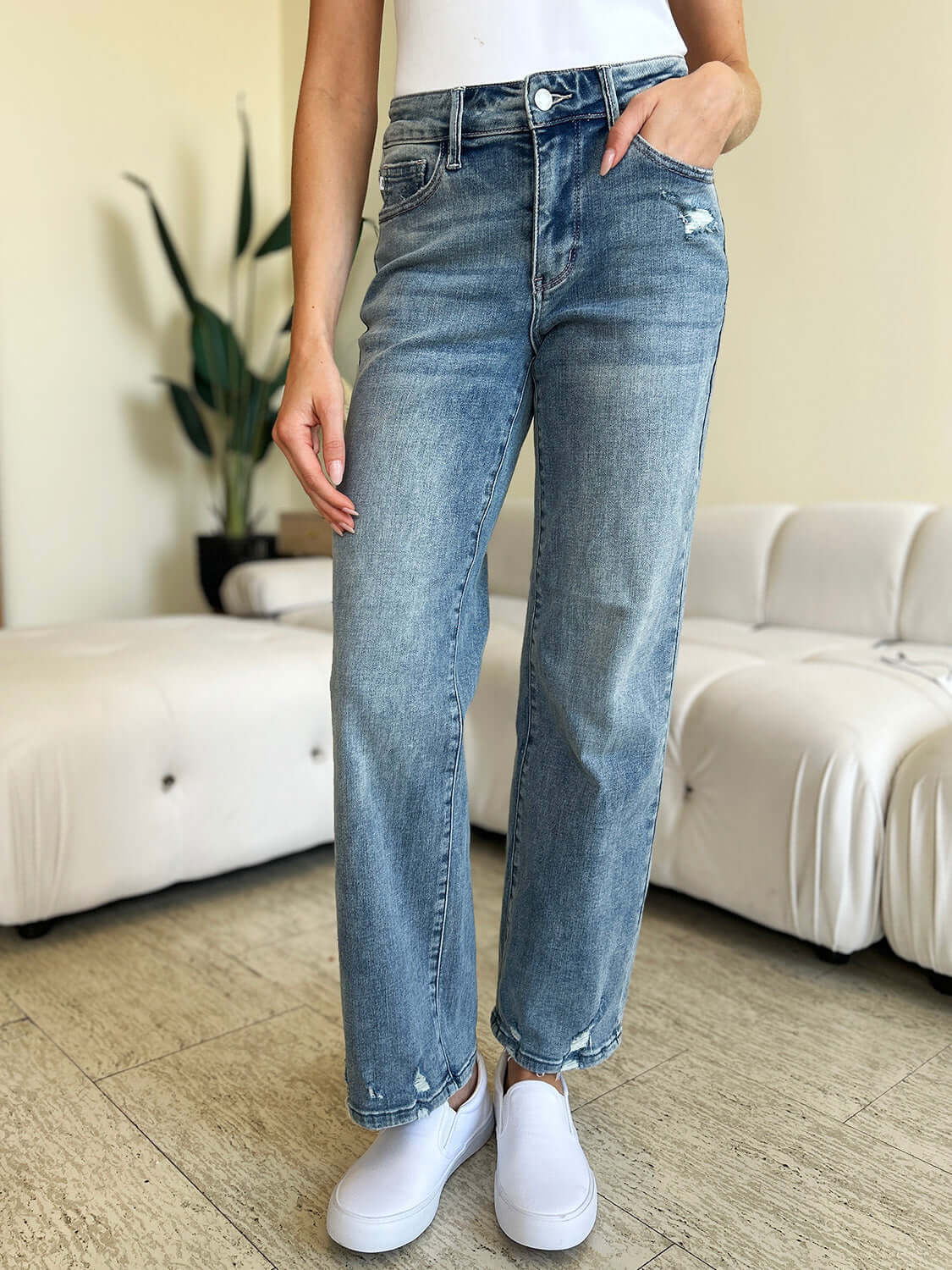 Model Wearing High Waist Distressed Straight Judy Blue Jeans with White Sneakers