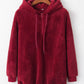 Cozy red teddy hoodie with drawstring and pocket, perfect for chilly days and casual outings.