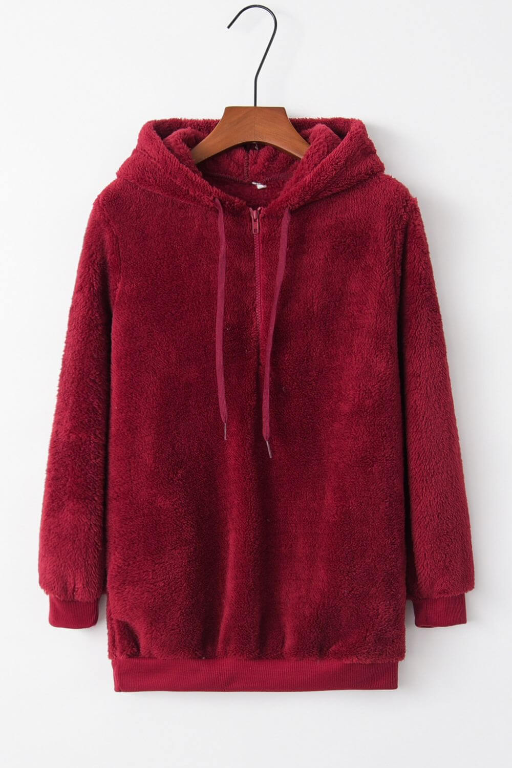 Cozy red teddy hoodie with drawstring and pocket, perfect for chilly days and casual outings.