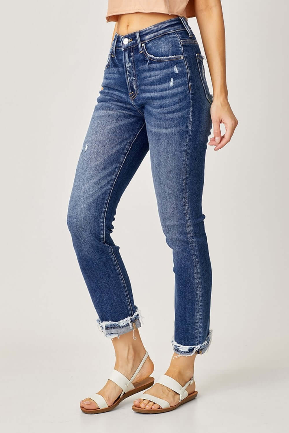 Trendy High-Rise Frayed Cuffed Straight Risen Jeans for a stylish and versatile look.