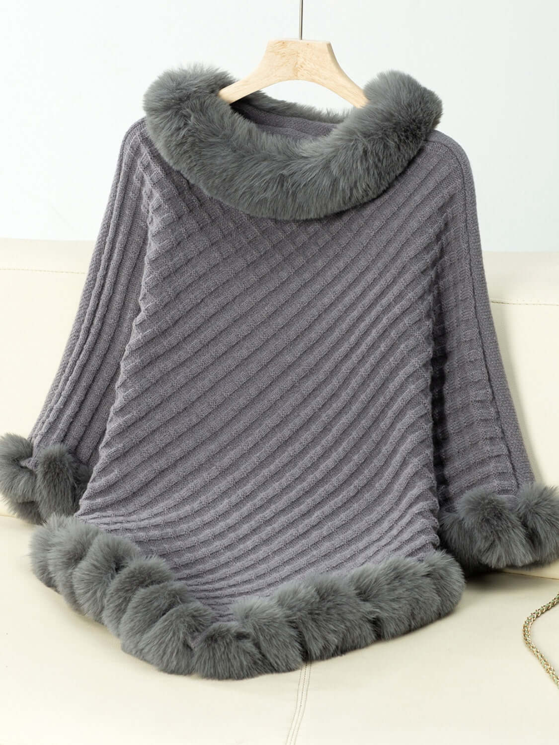 Cozy Bella Road fuzzy trim poncho in gray with unique texture and three-quarter sleeves, perfect for chilly days.