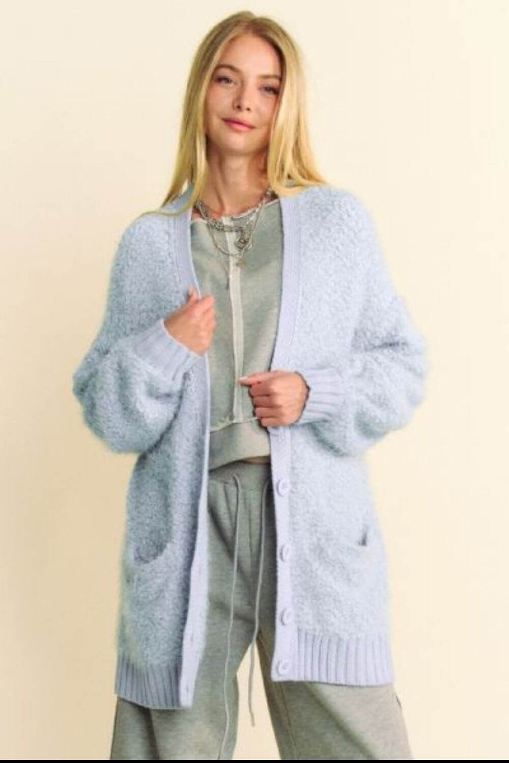 Light blue ribbed hem button up cardigan, cozy and stylish, perfect for layering over casual outfits.