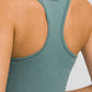 Back view of Millennia Round Neck Racerback Active Tank in teal, showcasing sporty design and comfort.