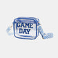 Transparent crossbody bag with "GAME DAY" letters and blue patterned strap, perfect for stadiums and easy security checks.