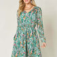 DOUBLE TAKE Full Size Printed Drawstring Waist Long Sleeve Dress at Bella Road