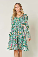 DOUBLE TAKE Full Size Printed Drawstring Waist Long Sleeve Dress at Bella Road