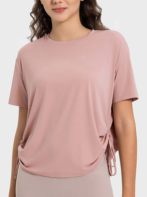 Millennia drawstring round neck short sleeve active t-shirt in soft pink, featuring breathable fabric and stylish design.