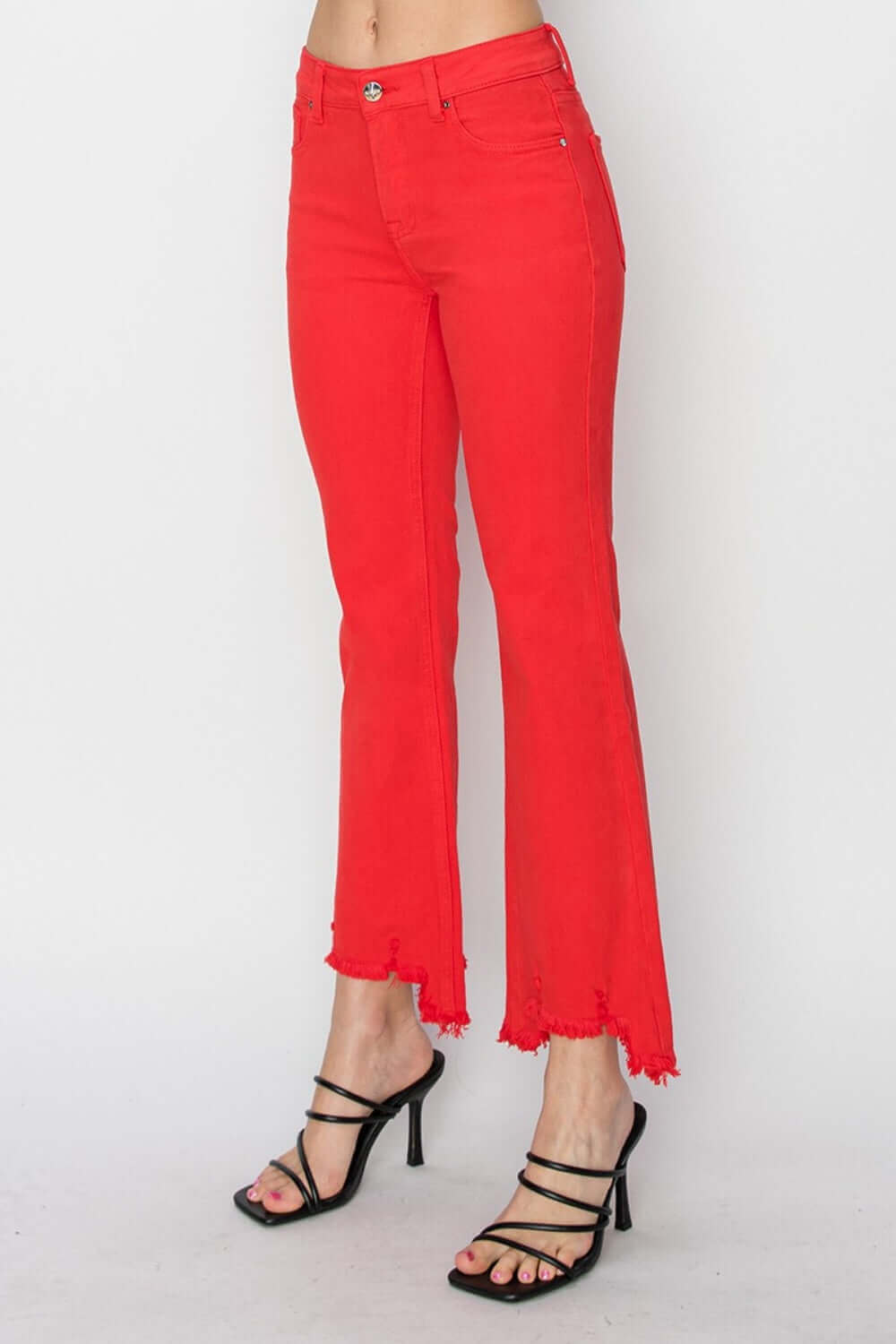 Risen Jeans in vibrant red with raw hem, bootcut silhouette, and pockets, perfect for a stylish and functional petite fit.