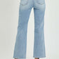 Back view of woman wearing RISEN Full Size High Rise Straight Jeans in light blue denim with heels