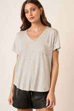 Woman wearing a stylish Striped V-Neck Short Sleeve T-Shirt with a flattering V-neckline and trendy stripe pattern for a casual look