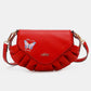 Red Nicole Lee USA graphic crossbody bag with butterfly design and ruffled edges