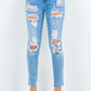 High waist destroyed jeans with distressed detailing and a flattering fit.