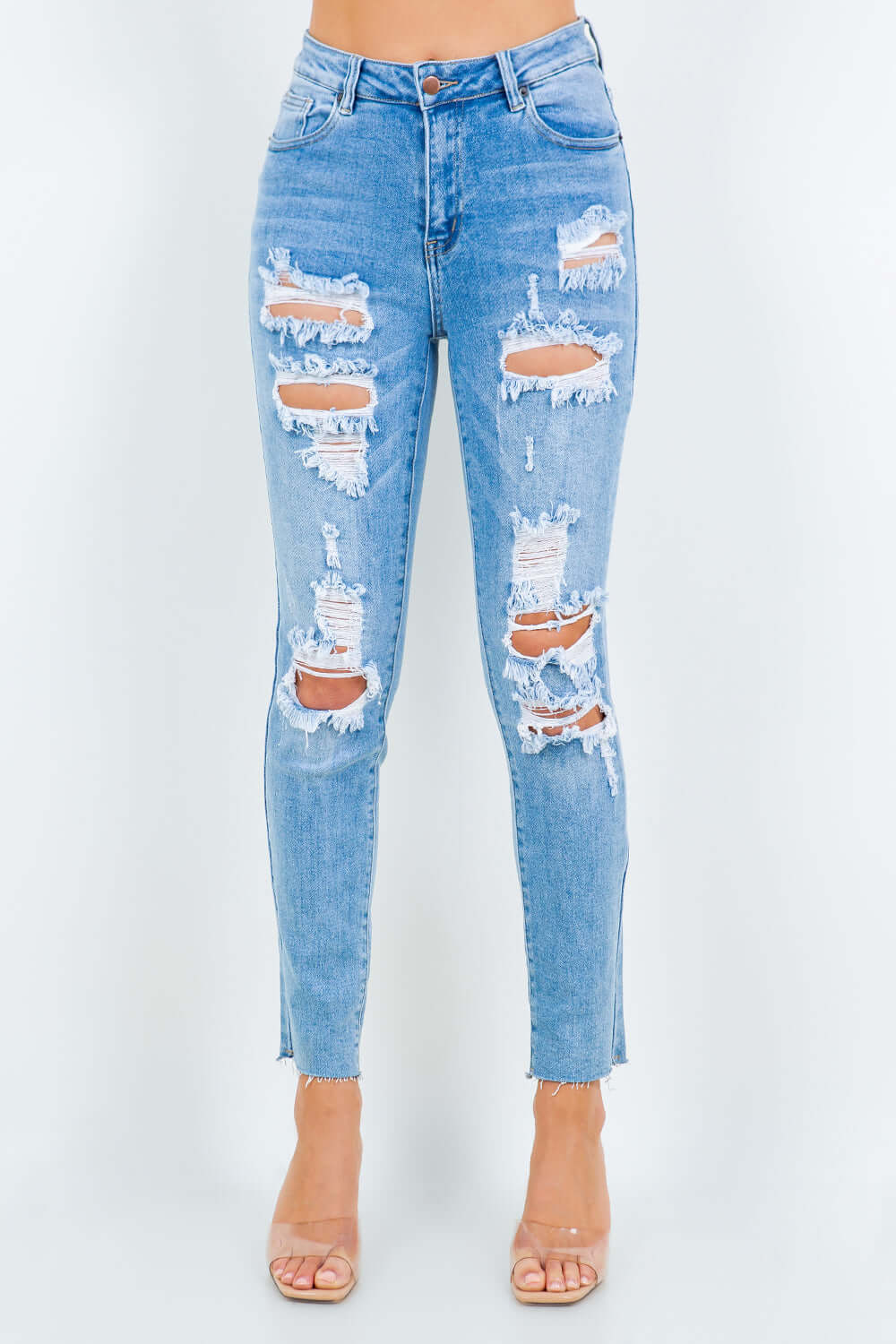 High waist destroyed jeans with distressed detailing and a flattering fit.