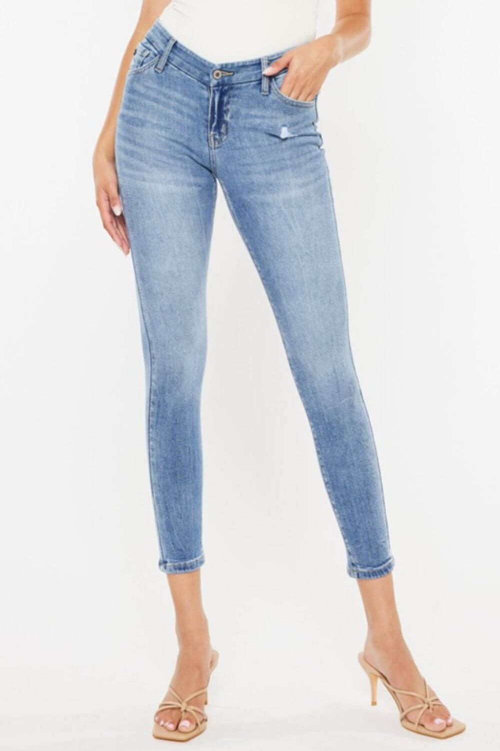 High Waist Cat's Whiskers Skinny Jeans on model, highlighting figure-flattering high waist design and vintage-inspired distressed detailing.