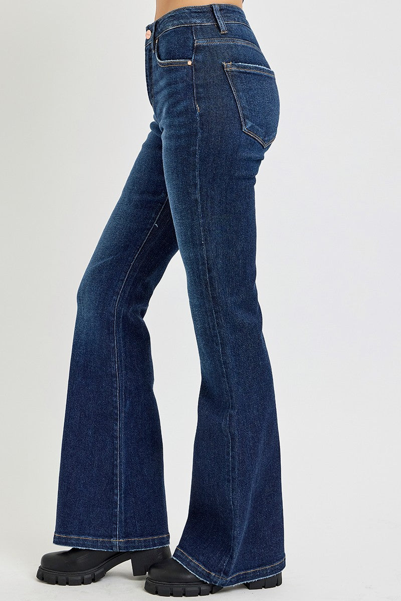 High Rise Flare Jeans with Pockets, showcasing retro style and chic flair ideal for vintage fashion lovers.