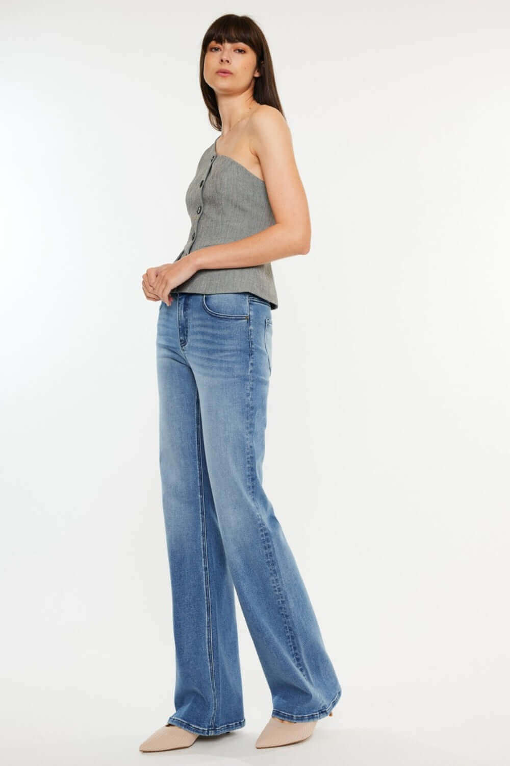 Ultra High Rise Cat's Whiskers Jeans modeled with a grey tank top, showcasing the flattering high-waisted silhouette and vintage detailing