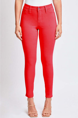 Hyperstretch Mid-Rise Skinny Jeans by YMI Jeans in vibrant red color, showcased on model.