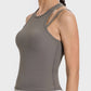 Millennia Cutout Round Neck Racerback Active Tank in olive green, highlighting stylish cutout design and comfortable fit.