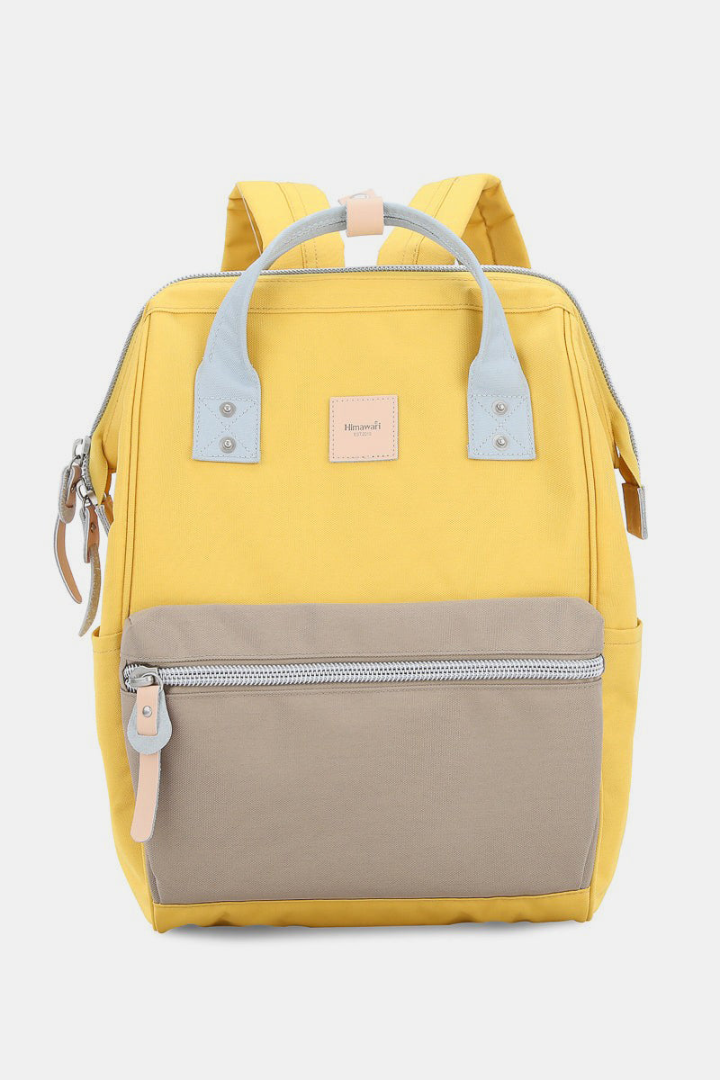 Himawari yellow canvas backpack with side pockets, eco-friendly and water-resistant, perfect for adventures and daily use.