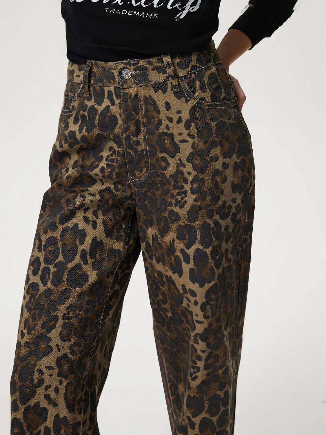 Bella Road Denim Leopard Straight Jeans showcasing bold leopard print and functional pockets. Perfect for a statement look!