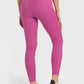 Back view of Millennia high waist ankle-length yoga leggings in vibrant pink, perfect for workouts and yoga sessions.