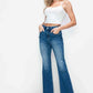 Model showcasing bytos Full Size High Rise Bootcut Jeans with Pockets, perfect for a chic and modern look.